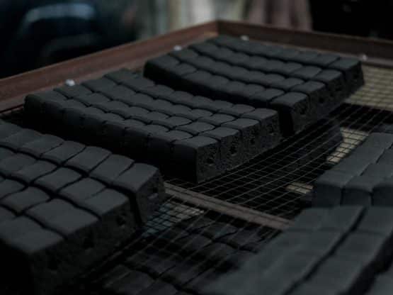 Clean grilling using Eco-Friendly Charcoal with minimal smoke.